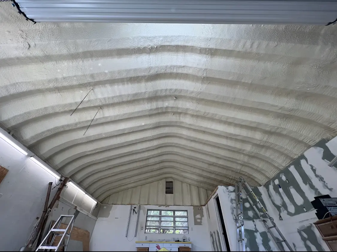 Spray polyurethane foam applied to the underside of a metal roof deck in Thermalito